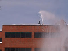 Snowblowing a corporate building