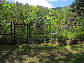 Small reservoir near parking lot