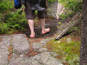 Happily splashing through puddles