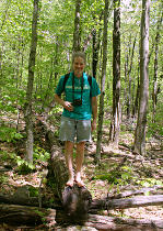 Standing on a cut log