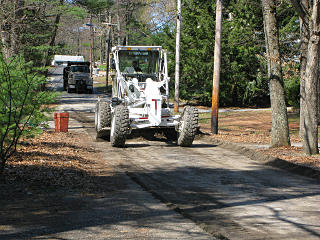 Springtime road-grading ritual