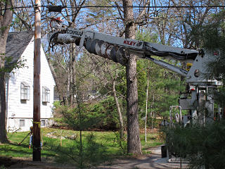 Power truck arrives to hold pole