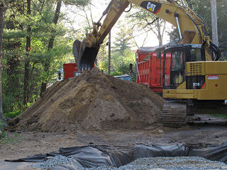 Moving big mound of dirt