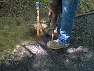 Hammering up small bit of pavement