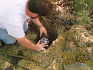 Backfilling around curb-box piece