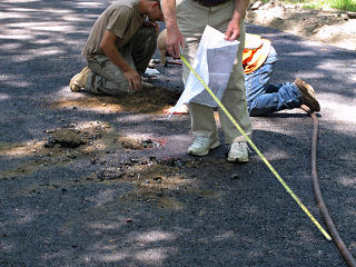 Road peppered with test holes