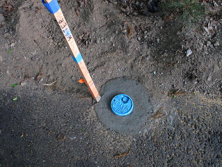 Grouted curb box