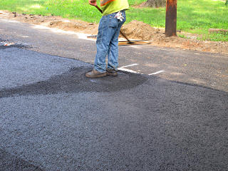 Clearing off manhole cover