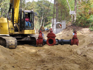 Tee assembly brought by backhoe