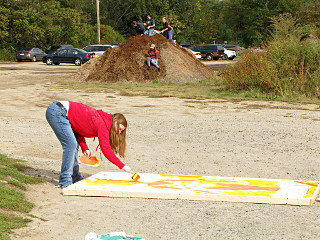 Work continues, kids on mulch mound