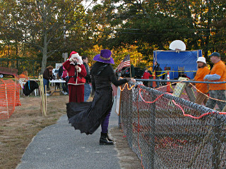 Costumed staff taking pix of each other